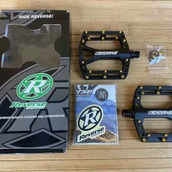 Reverse Components Black One Plattformpedale / Pedale Schwarz/gold